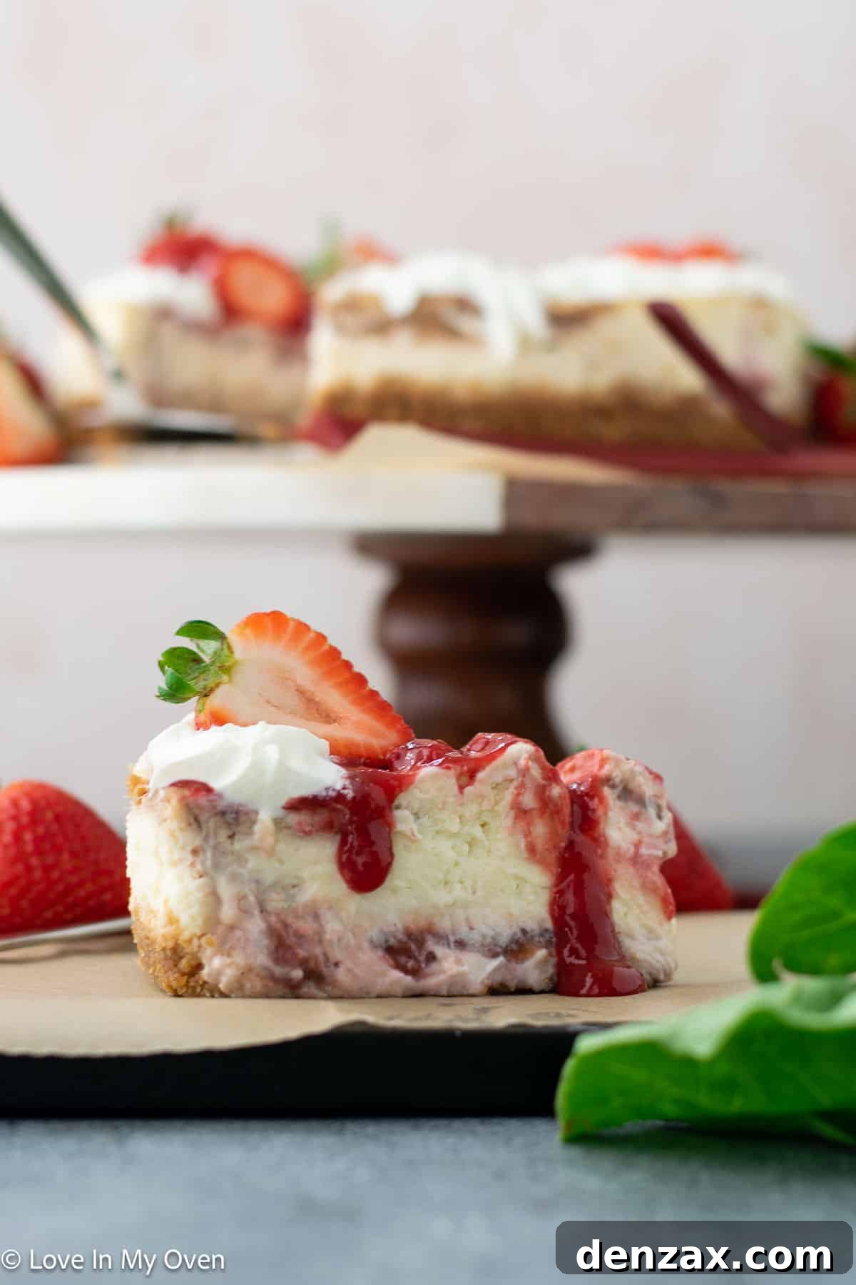 Overhead shot of two slices of strawberry rhubarb cheesecake