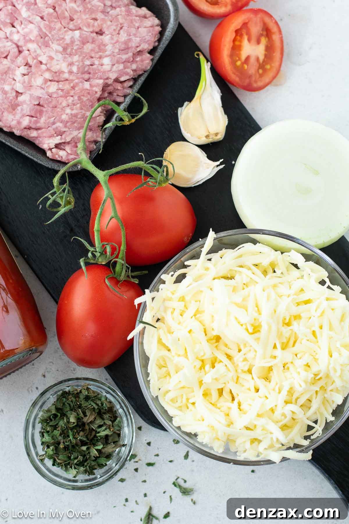Fresh ingredients laid out for Sausage Ravioli Bake preparation