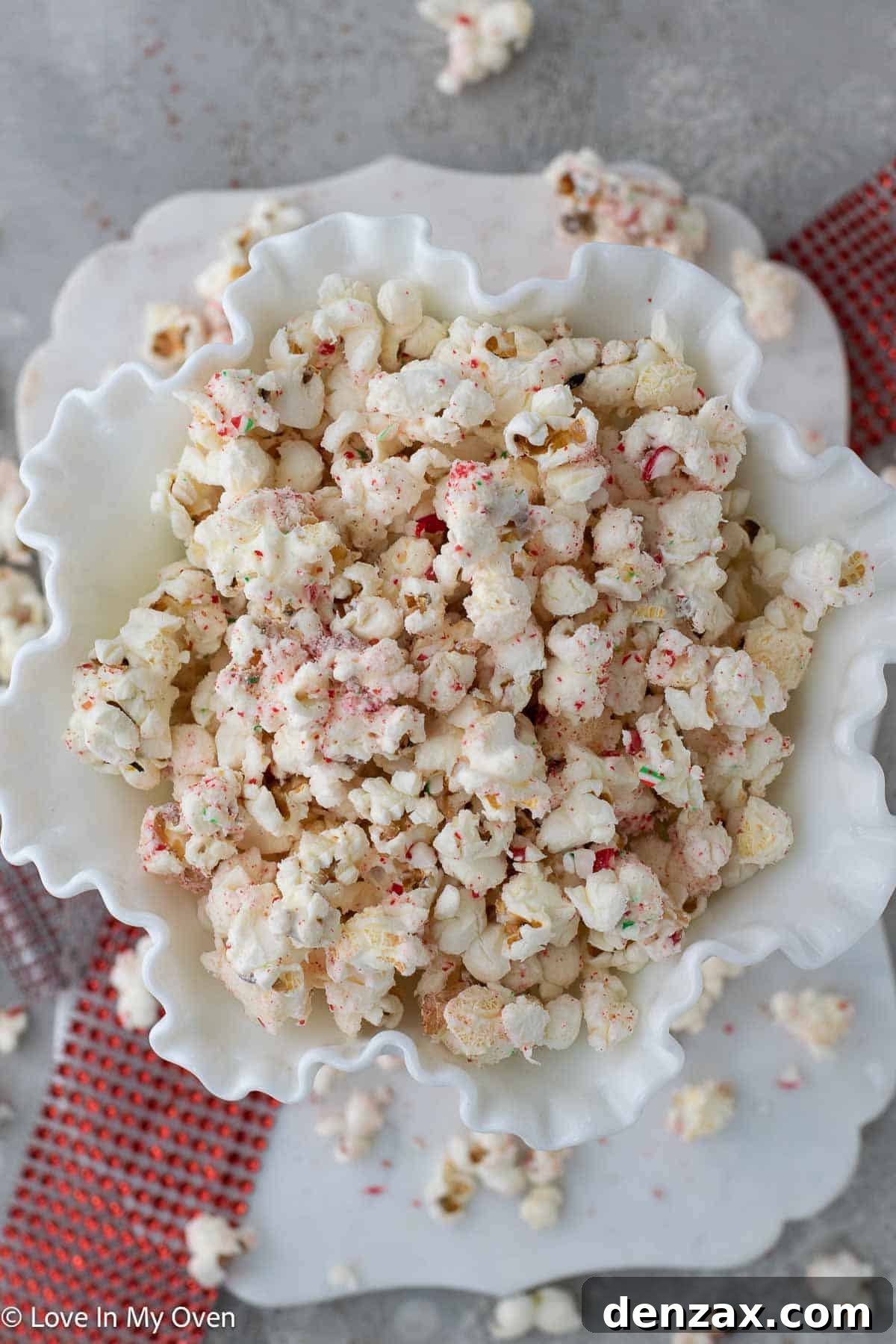 Festive Peppermint White Chocolate Popcorn served in a bowl, perfect for holiday snacking or gifting.