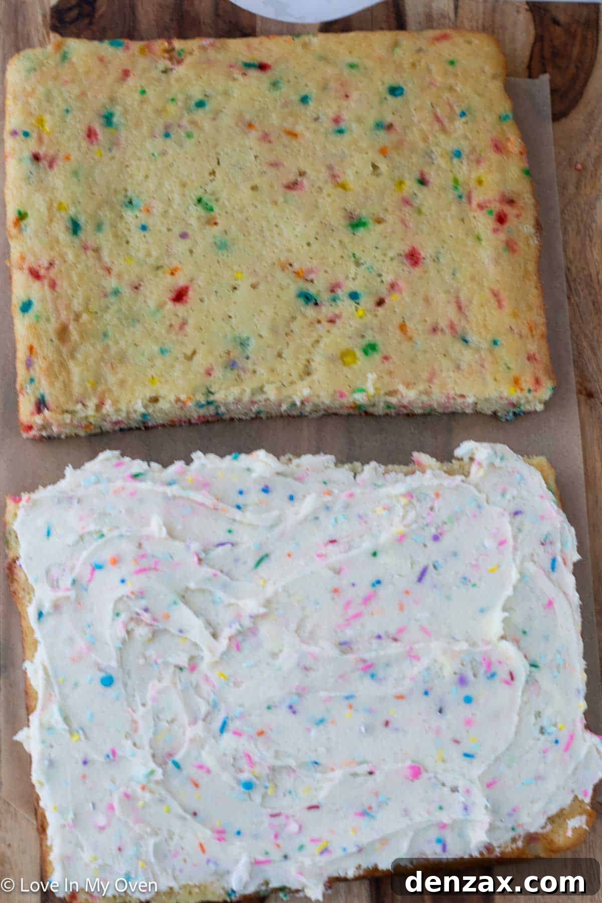 Cake sandwich being cut on a cutting board