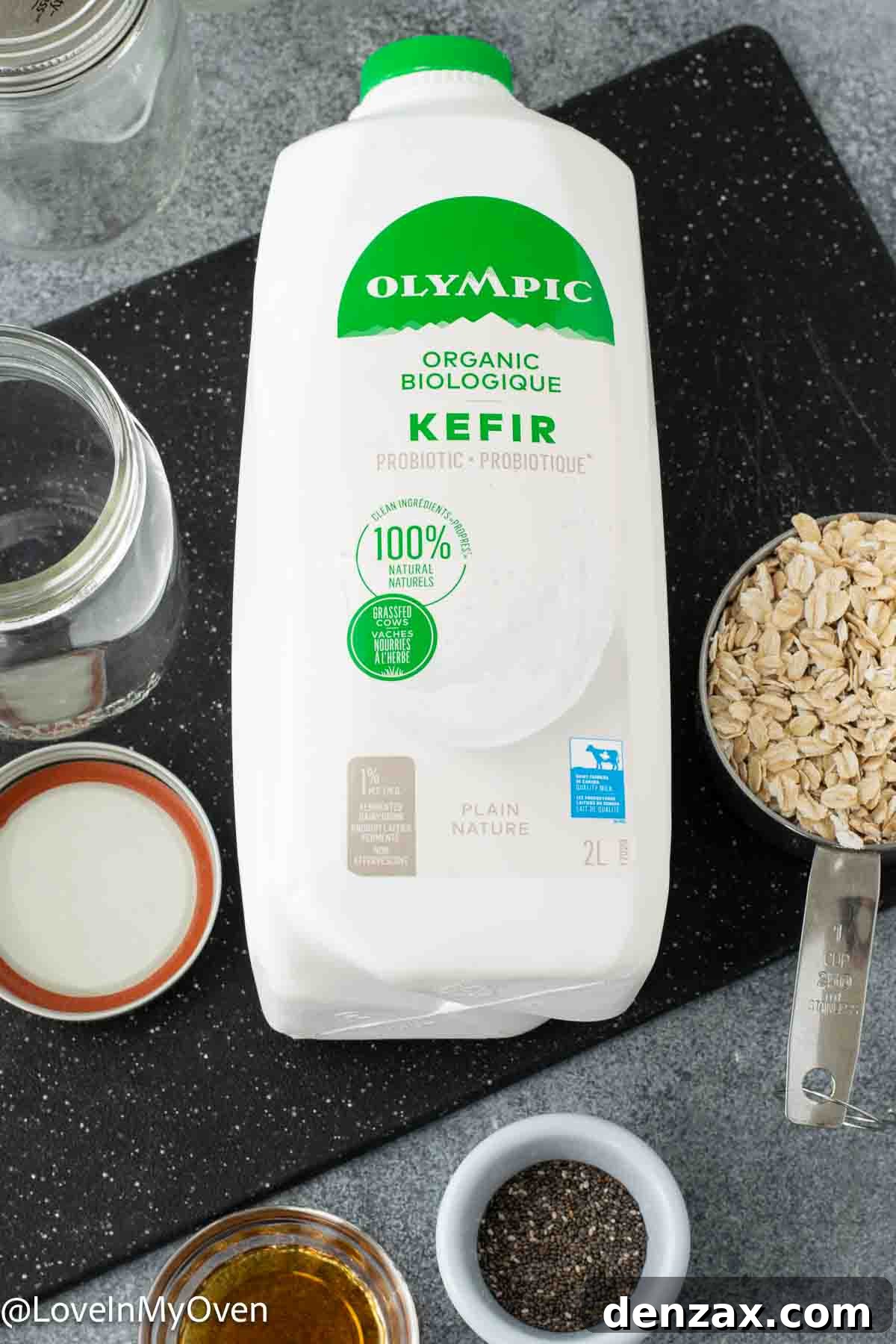 Ingredients for kefir overnight oats including rolled oats, kefir, maple syrup, and chia seeds.