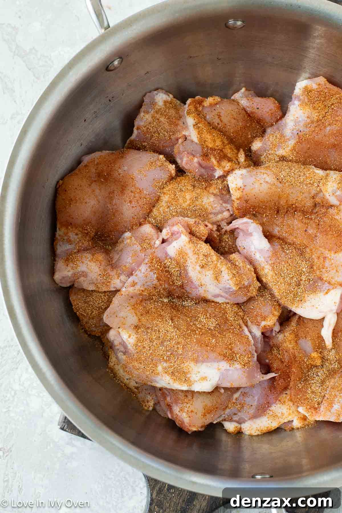 Shredding chicken with two forks