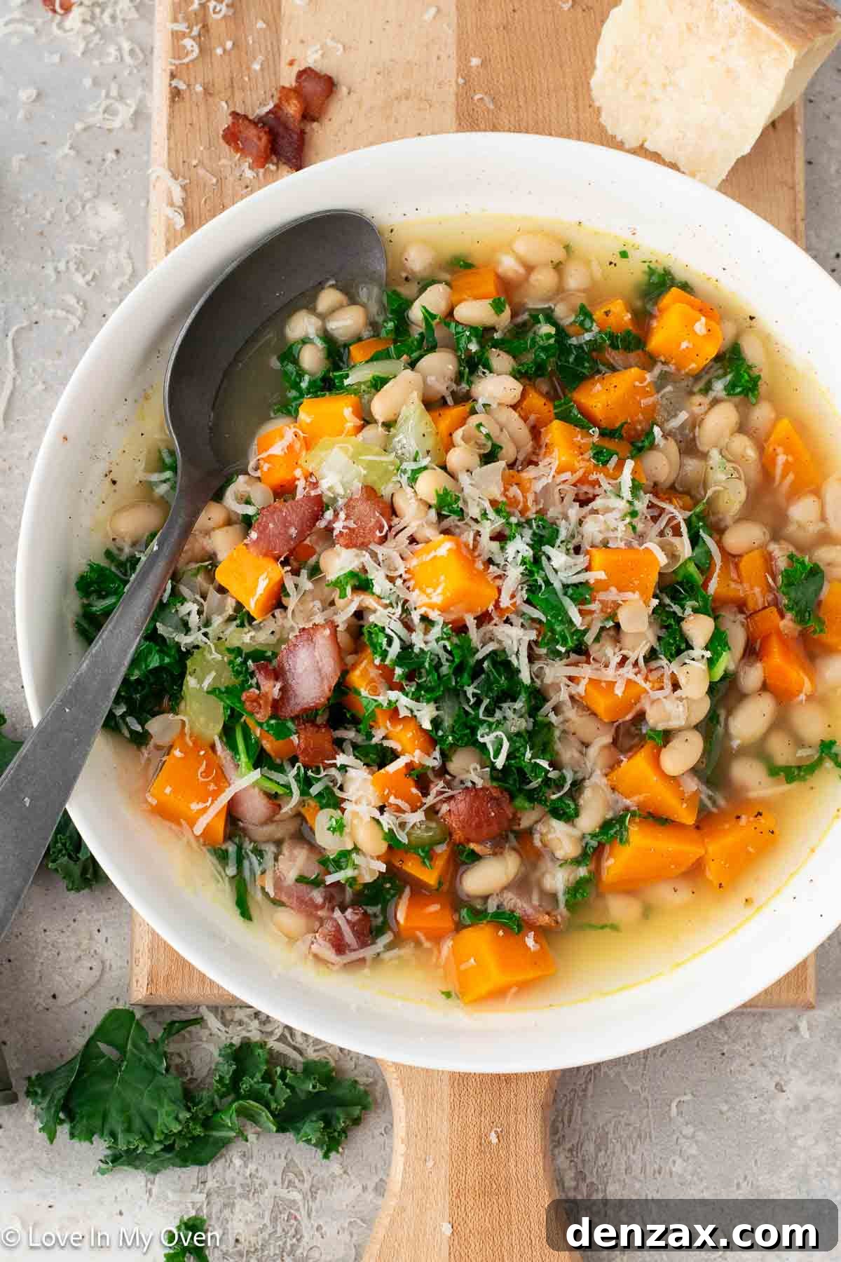 Flavorful Sweet Potato and White Bean Soup topped with crispy bacon