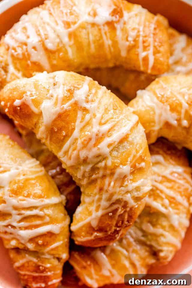 prepared pumpkin crescent rolls in an orange bowl