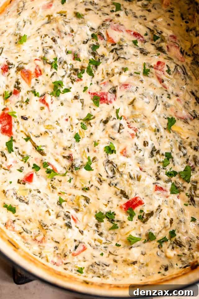 upclose overhead shot of cooked spinach artichoke dip