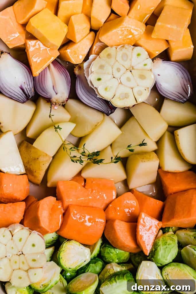 Chopped carrots, brussels sprouts, potatoes and butternut squash.