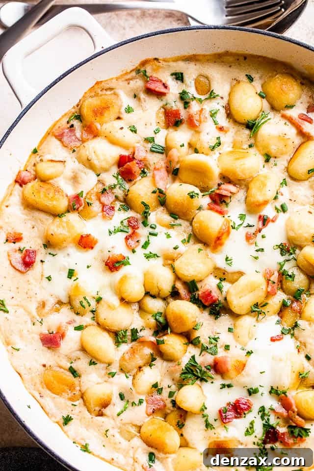overhead shot of a baking dish with gnocchi bacon casserole, ready to be served