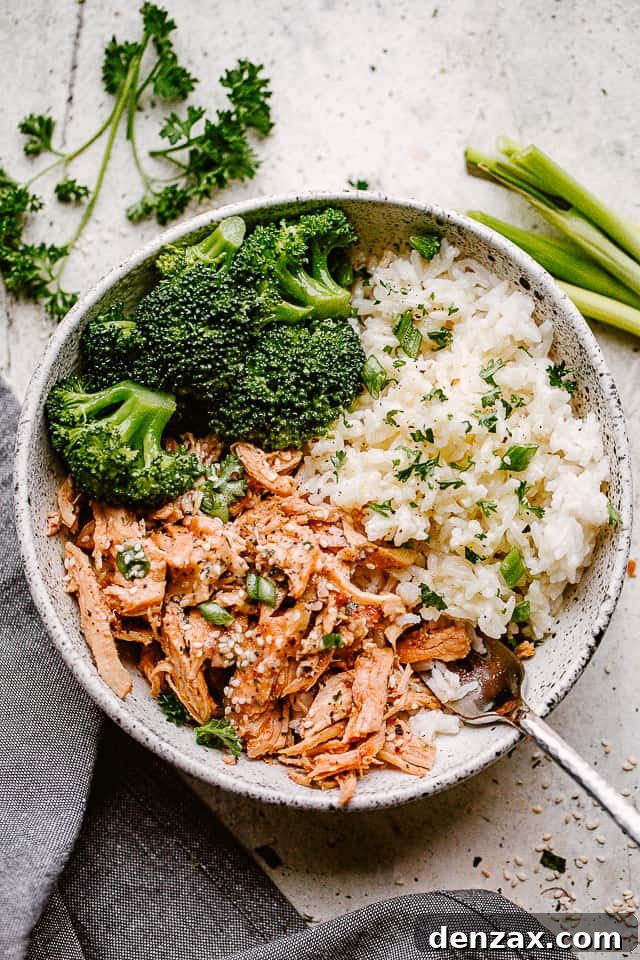 A vibrant bowl of Instant Pot Honey Garlic Chicken served with rice, ready to be enjoyed.