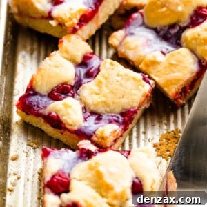 Pan of Cherry Kuchen Bars Topped with Glaze