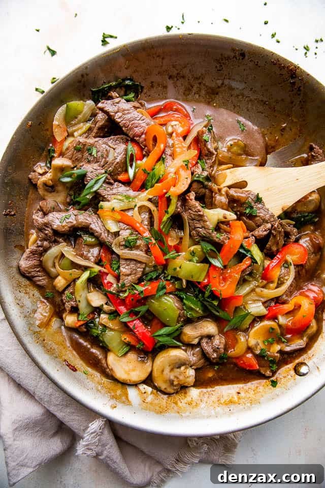 Glazed Honey Balsamic Beef Stir Fry 3 overhead wide shot of a skillet with stir fried beef and vegetables