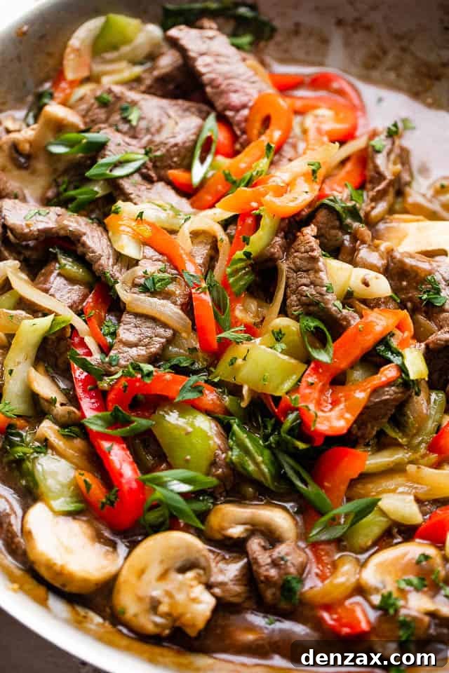 Glazed Honey Balsamic Beef Stir Fry 6 close up photo of beef stir fry with bell peppers, bok choy, mushrooms, and pepper