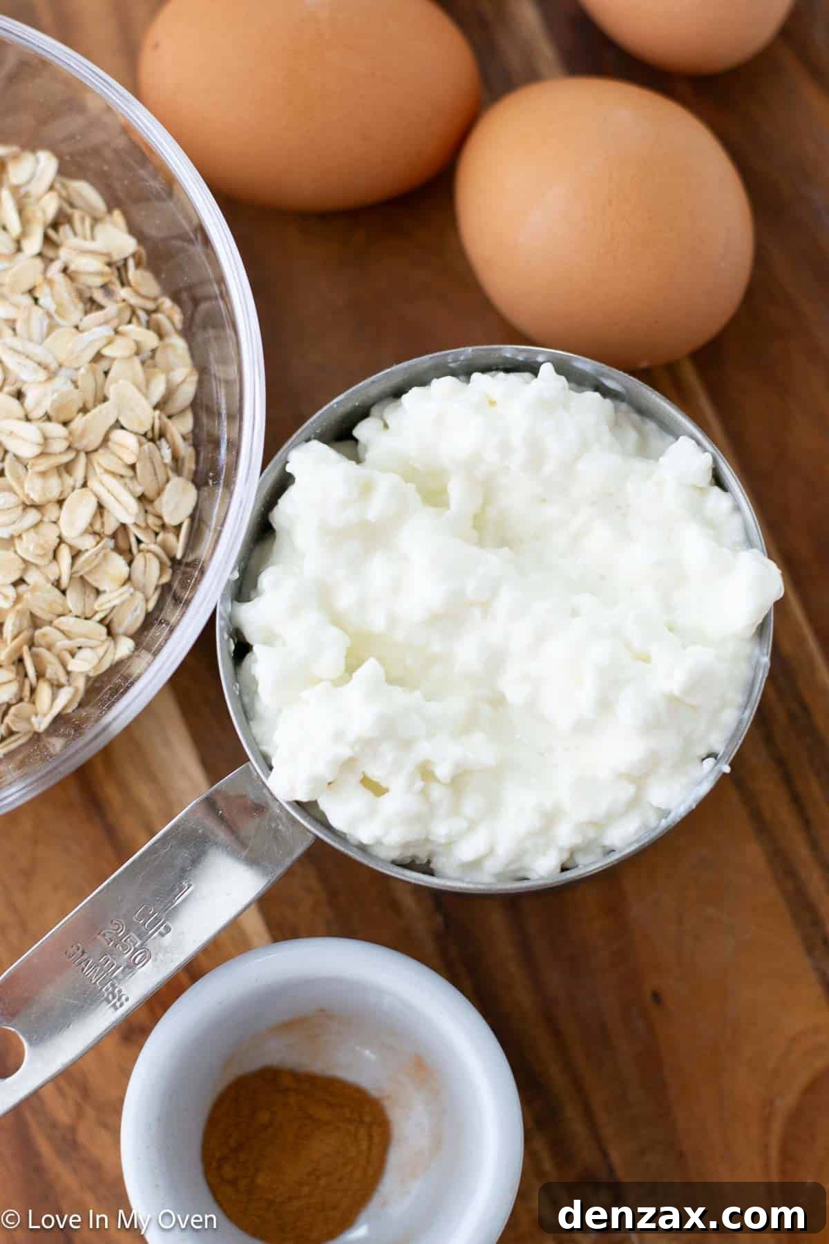 Close-up of cottage cheese, rolled oats, and eggs, the three main ingredients for high protein pancakes.