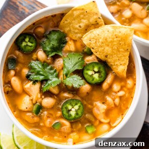 Hearty Chicken Chili 8 overhead shot of white soup bowls with chicken chili