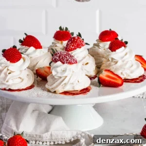 Sifting confectioners sugar onto pavlovas