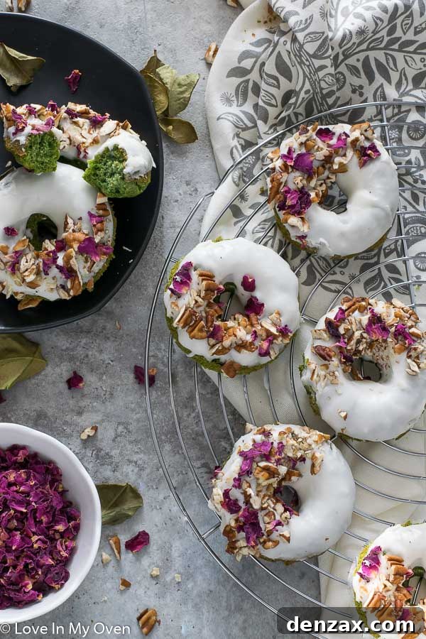 Green Monster Donuts - Vibrant green baked donuts with sprinkles on a wire rack.