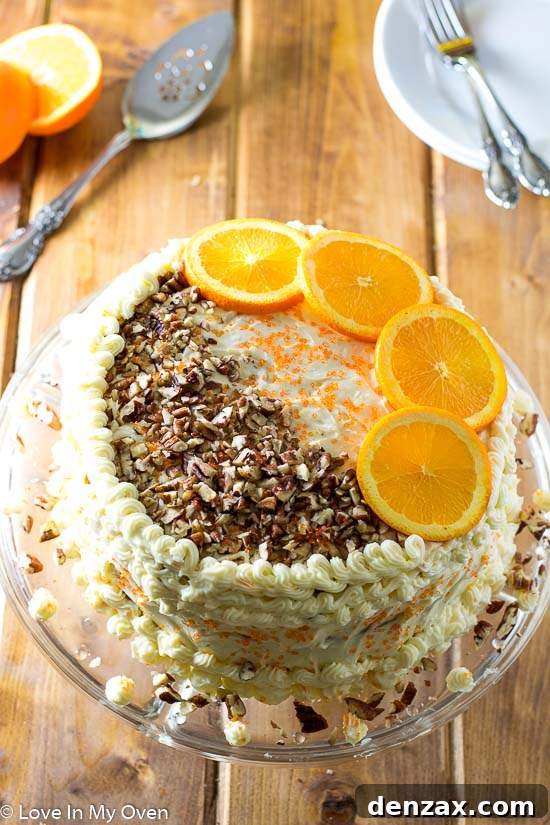 Delicious Orange Carrot Cake with cream cheese frosting, ready to be served.