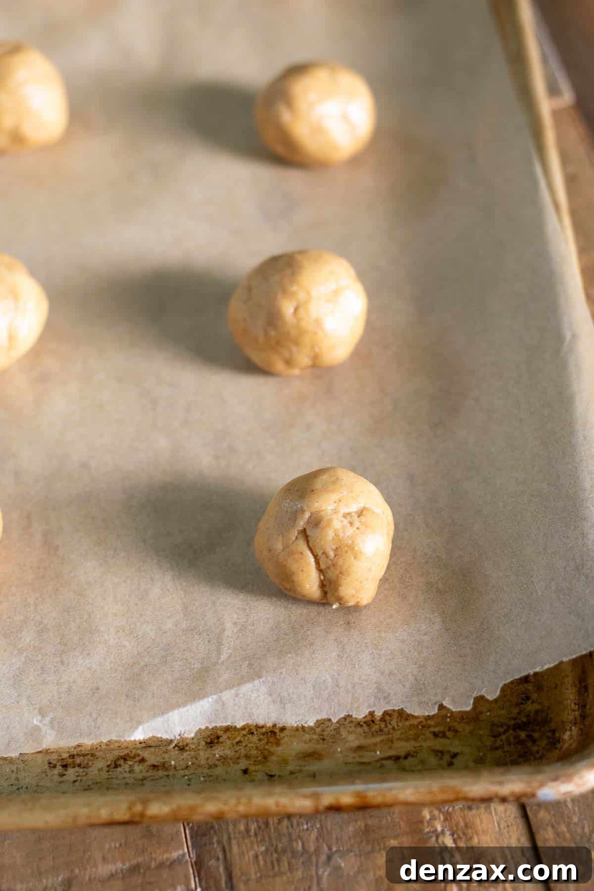 Mixing the three ingredients in a bowl to form cookie dough