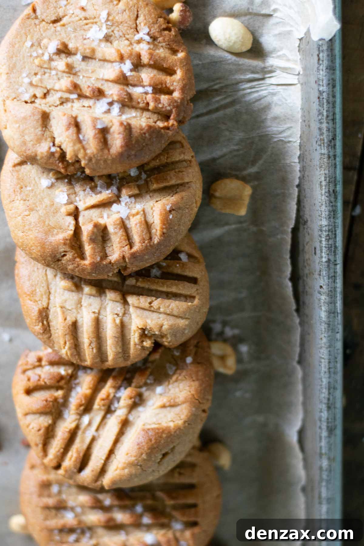 Freshly baked 3 ingredient peanut butter cookies with crisscross pattern