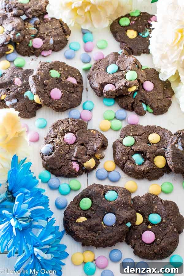 Delicious white chocolate chunk almond butter cookies adorned with pastel M&M's