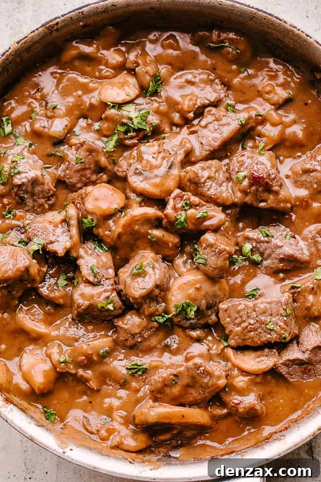 A close-up of the finished Beef Tips in Mushroom Gravy, ready to serve.