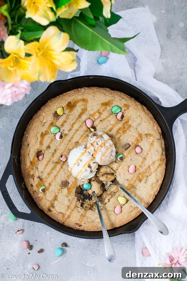 Giant Mini Egg Skillet Cookie, a perfect Easter dessert with crunchy chocolate candy