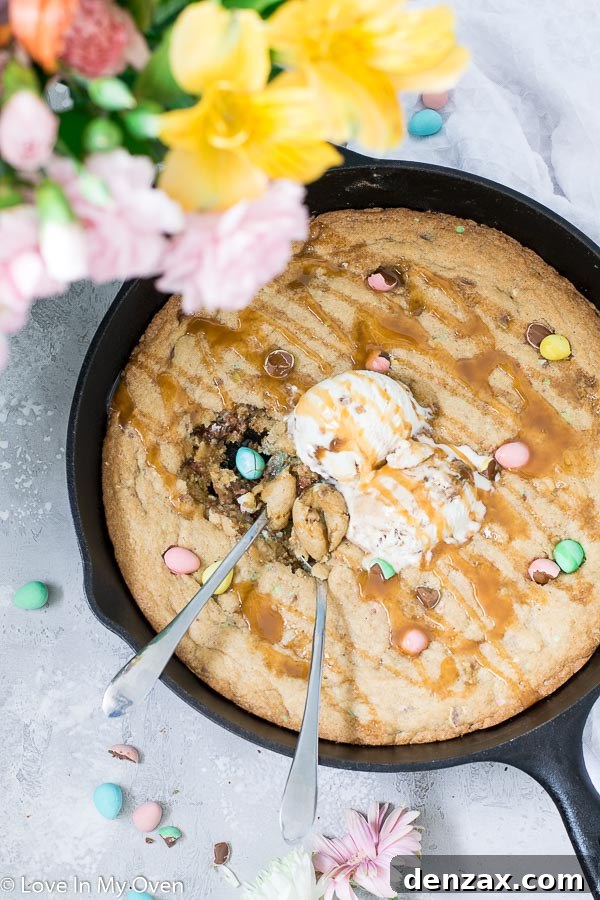 Warm Mini Egg Skillet Cookie served with ice cream and caramel sauce