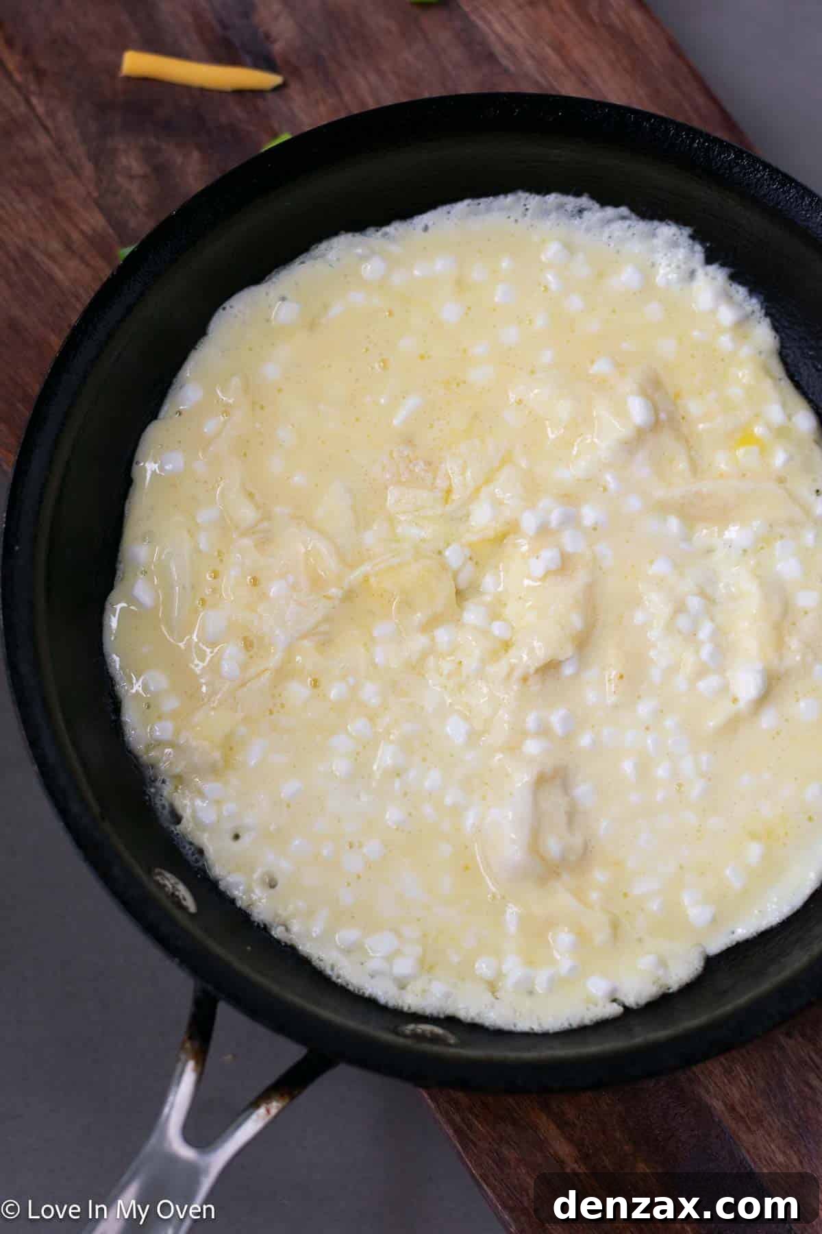 Whisking eggs and cottage cheese together