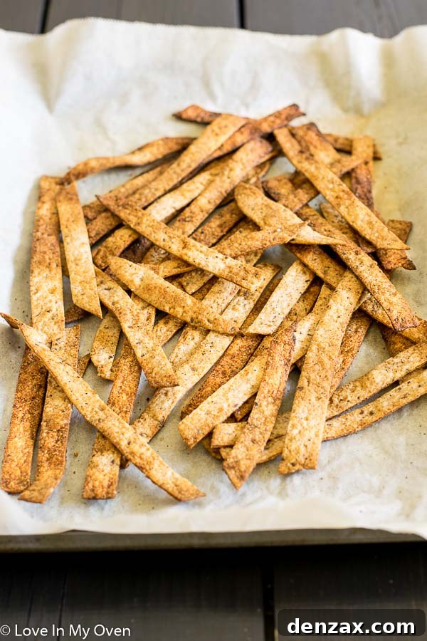 Homemade seasoned tortilla strips for a healthy taco salad.