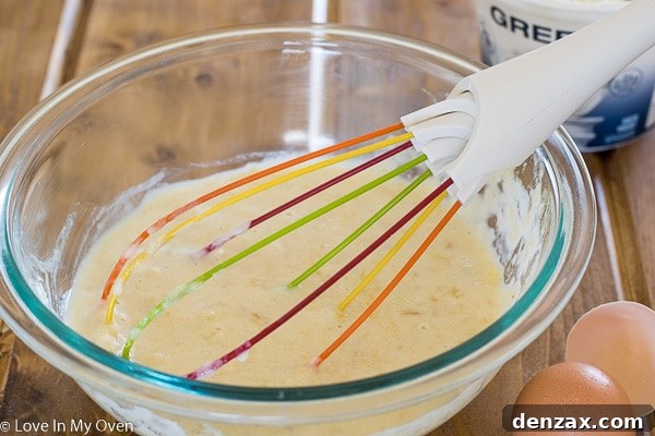 Preparing muffin batter for sugar-free banana muffins