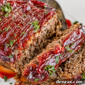 Meatloaf Covered in Barbecue Sauce on a White Serving Platter