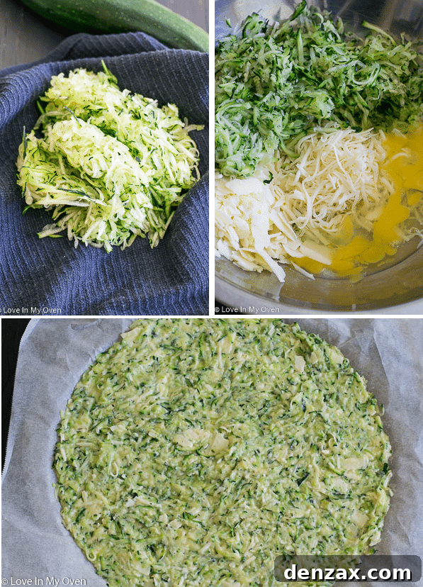 Hand squeezing excess water from shredded zucchini in a cheesecloth.