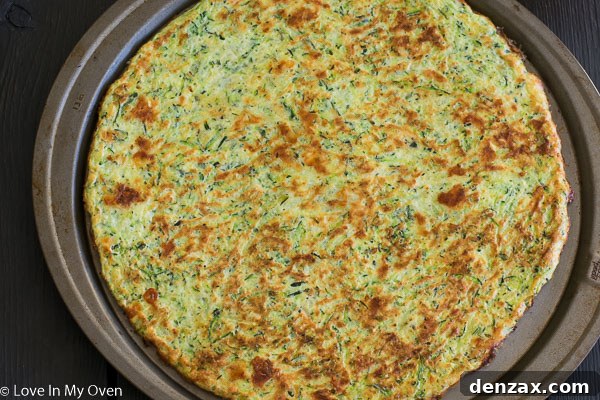 Flipped zucchini pizza crust, ready for toppings.
