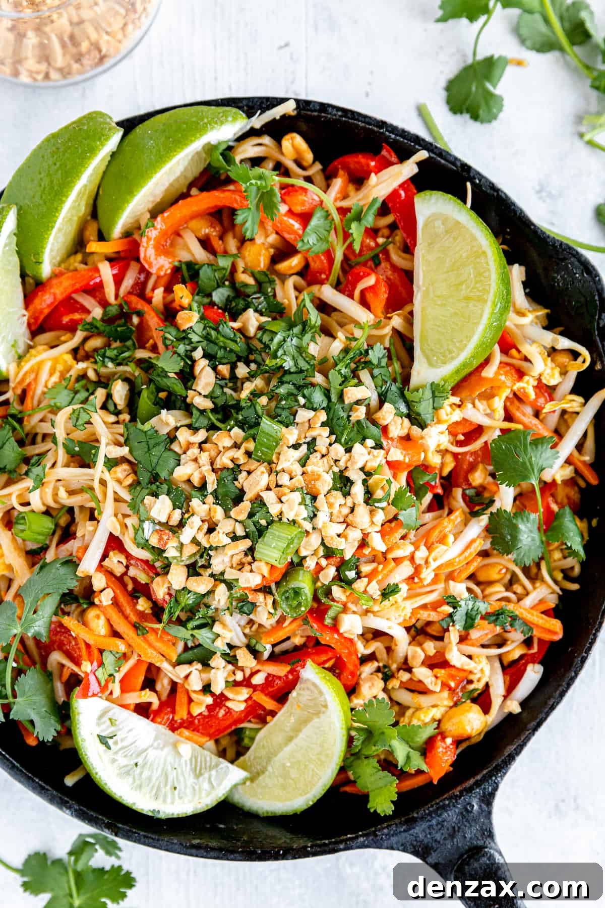 A Generous Portion of Pad Thai in a Black Skillet, Ready to Serve