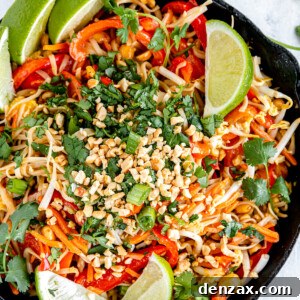 Homemade Pad Thai in a black skillet.