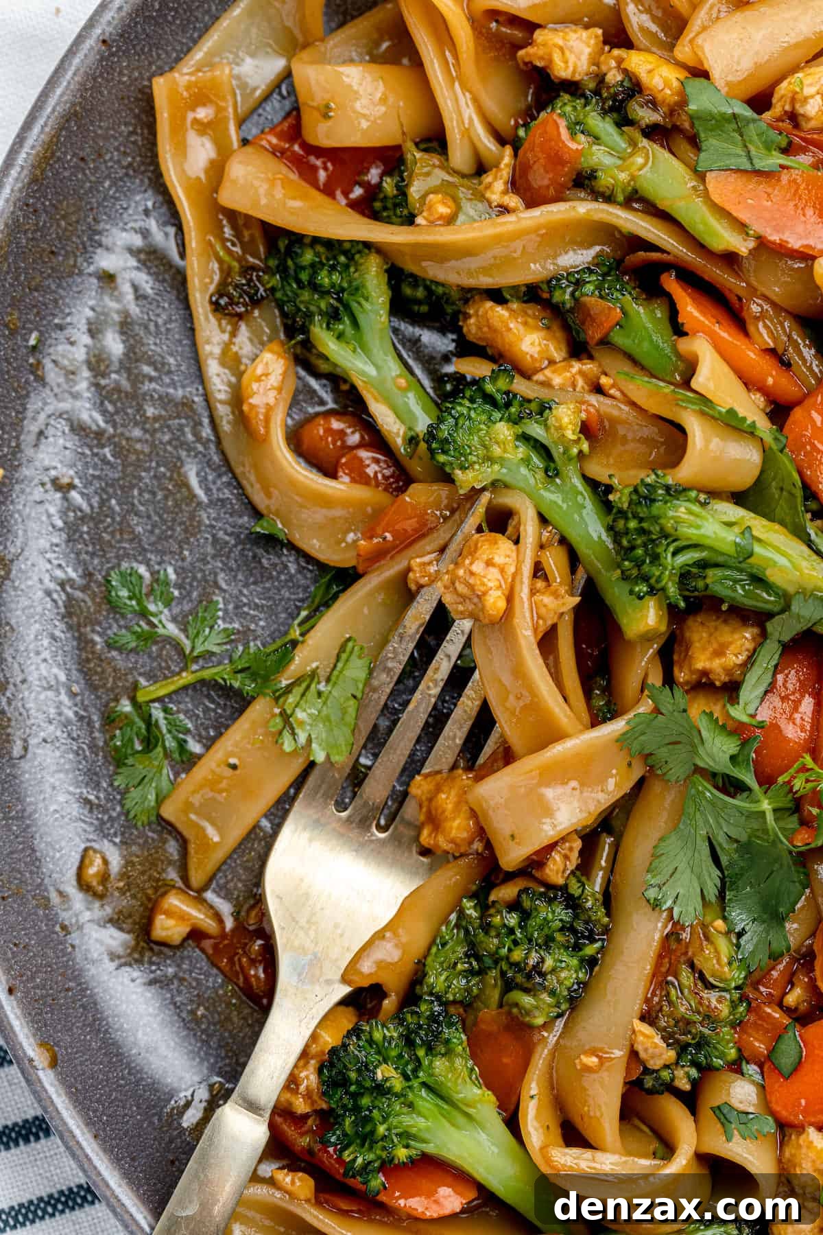 A Speckled Gray Plate Containing a Serving of Homemade Pad See Ew