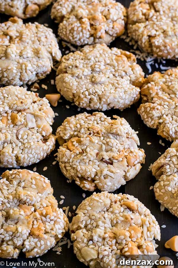 Close-up of baked Butterscotch Mountain Cookies with sesame seeds