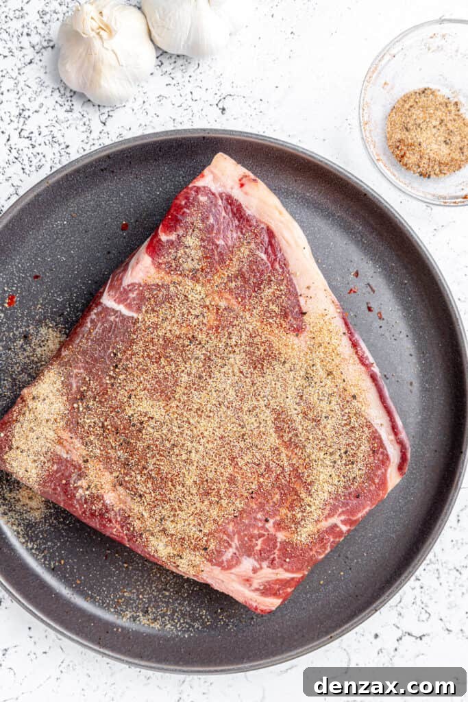 Seasoned chuck roast ready for browning in the Instant Pot.