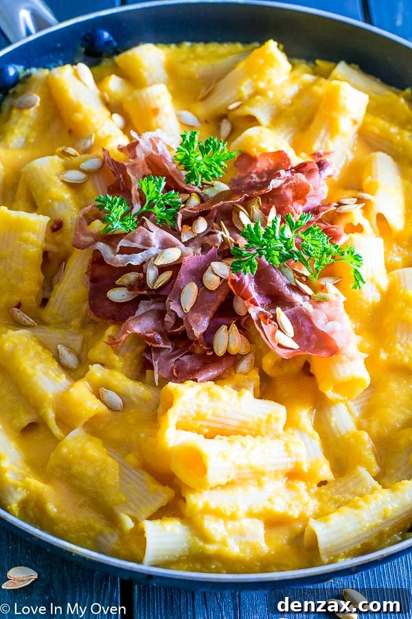 Butternut Squash Pasta with Crispy Prosciutto close-up, showcasing creamy sauce and golden noodles