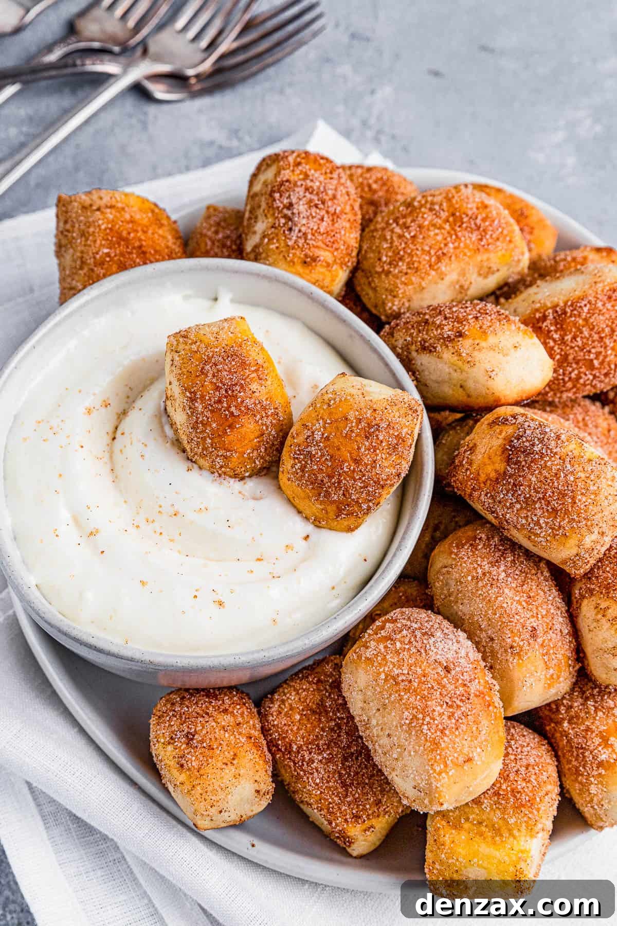 Cinnamon sugar pretzel bites in cream cheese dip