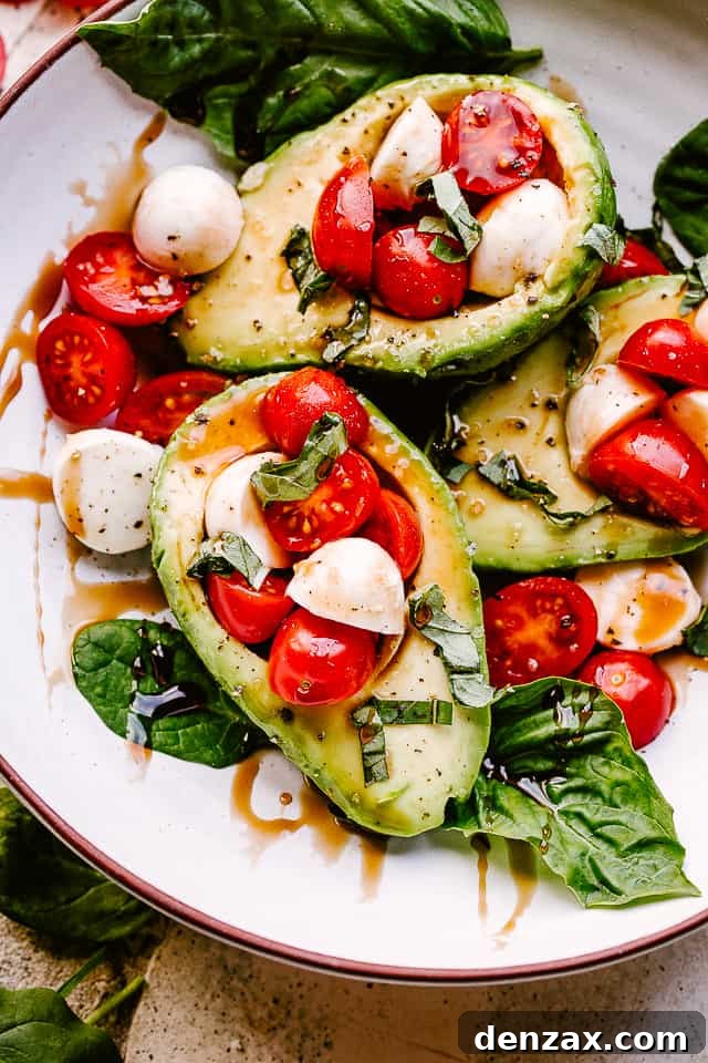 Caprese Stuffed Avocados on a plate
