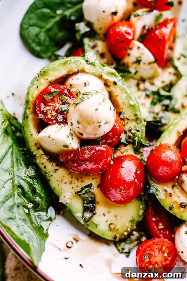 close up shot of Caprese Stuffed Avocados