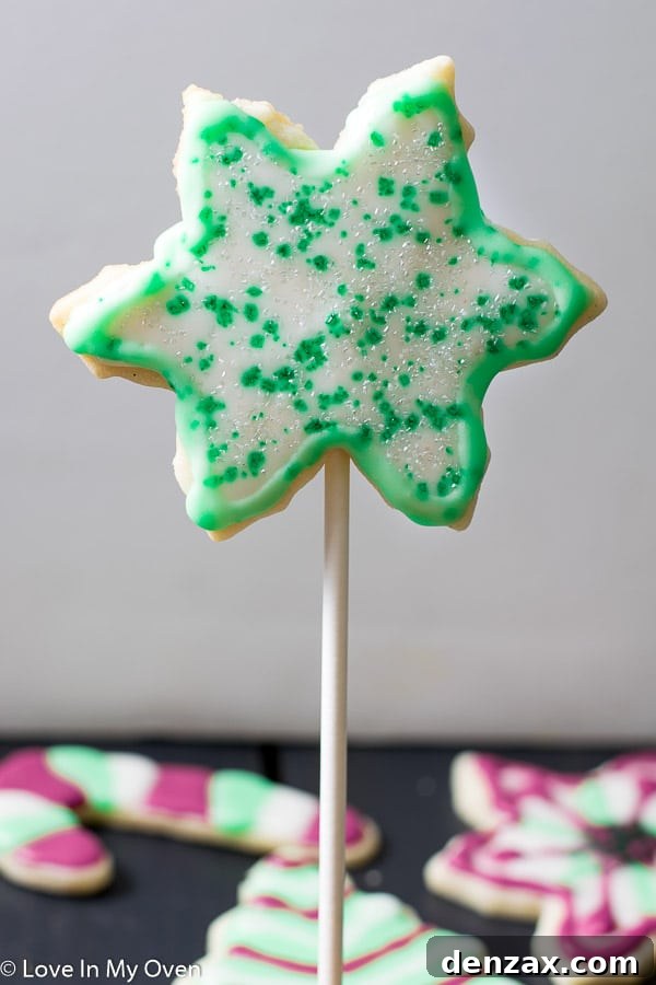 Festive Cookie Pop Treats 6 Assortment of festive vanilla bean cookie pops for the holidays, arranged beautifully