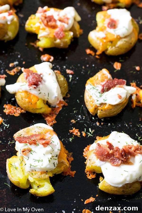 Close-up of baked smashed potatoes with toppings