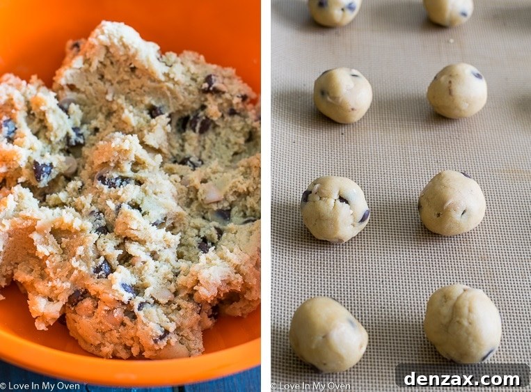 Cookie dough being mixed in a stand mixer, with the paddle attachment