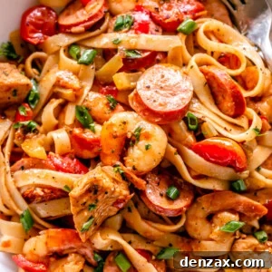 One Pot Jambalaya served in a white dish with pasta
