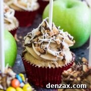 Caramel apple cupcakes decorated with various toppings