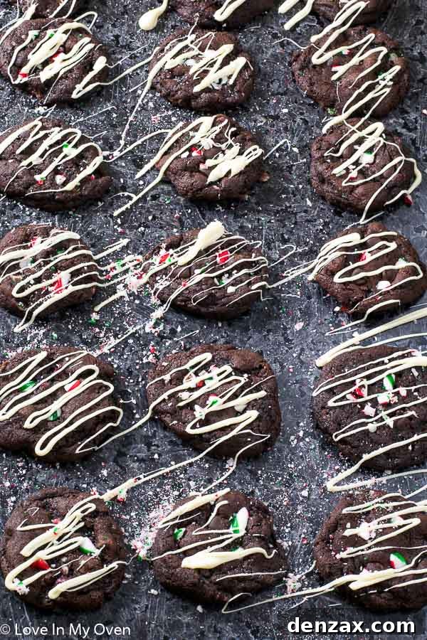 Close-up of baked Mint Chocolate Candy Cane Cookies with visible candy cane pieces and chocolate chips.