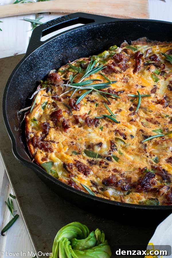 Close-up of a delicious Keto Chorizo Frittata slice, showing the eggs, chorizo, and vegetables.