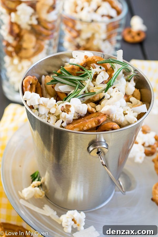 Close-up of freshly made Parmesan Rosemary Popcorn seasoned with herbs and cheese