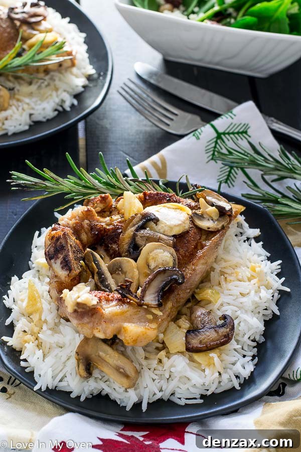Easy One-Pan Pork Chops and Rice 5 One-Pan Pork and Mushrooms Ready to Serve with Garnish